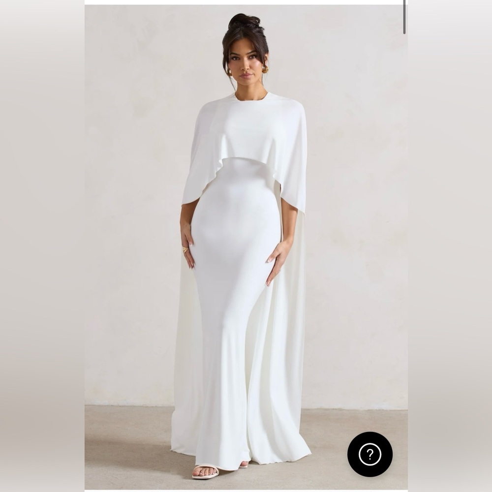 Brand new dress with the tags on. Size 4. Never used.